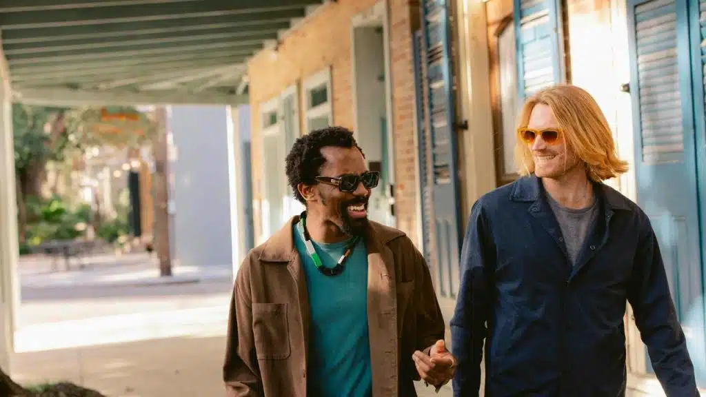 A pair of friends walking outdoors.