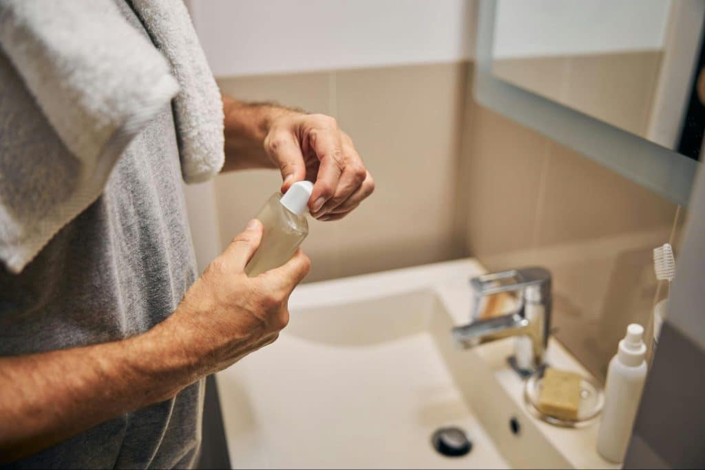 A man holding a mocked-up product.