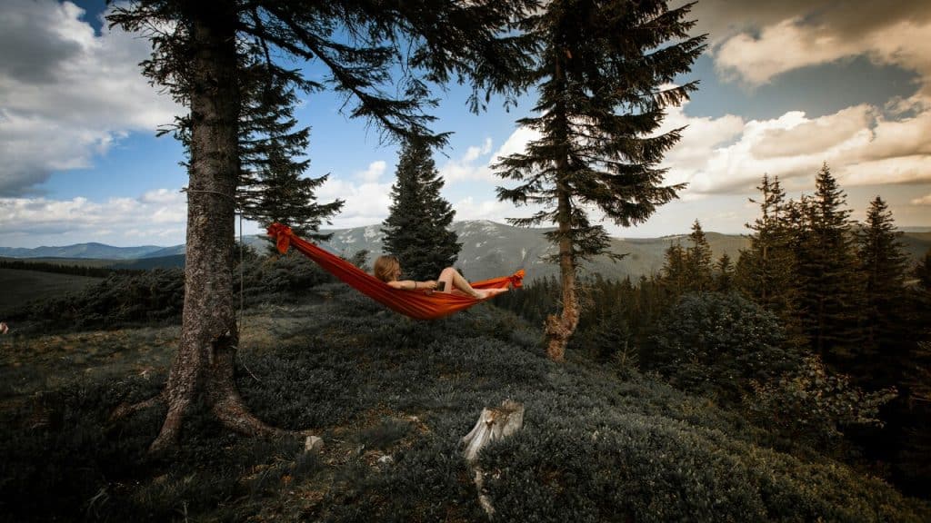 A woman resting on a hammock
