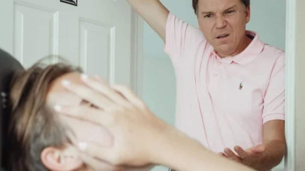 Dad maintaining emotional control during teen outburst