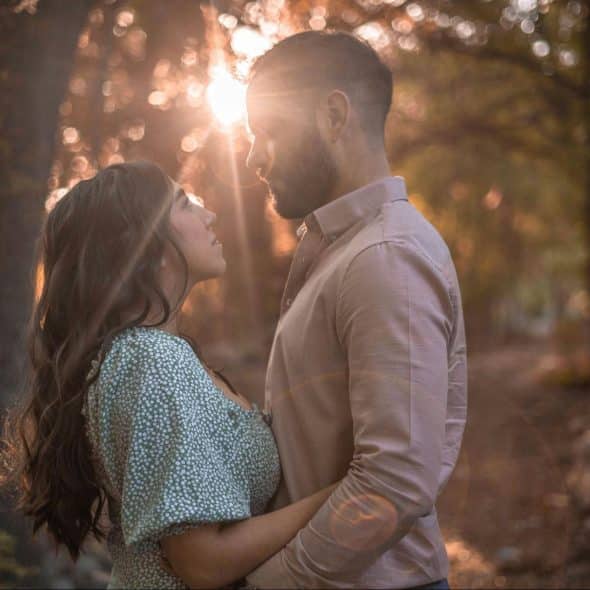 A man and woman looking at each other