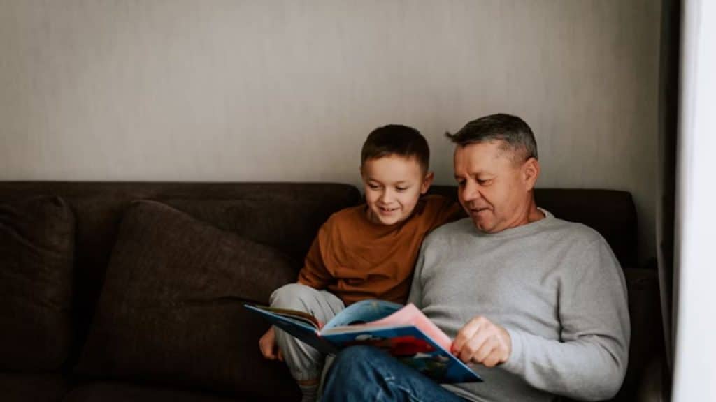Man sharing a nostalgic activity from his childhood with his child.