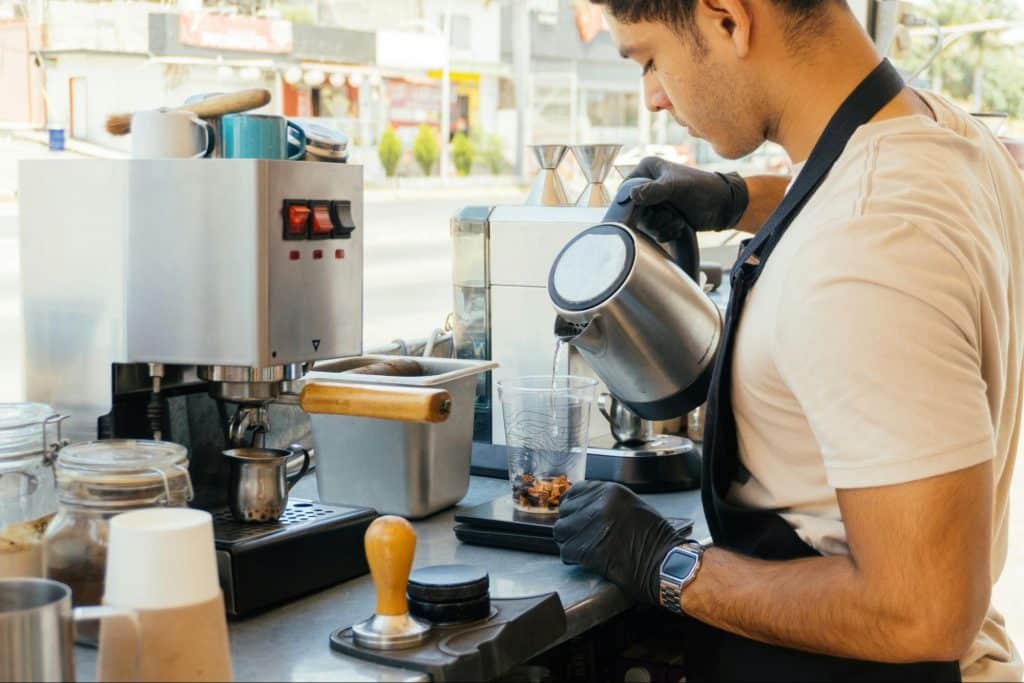 A man making a coffee