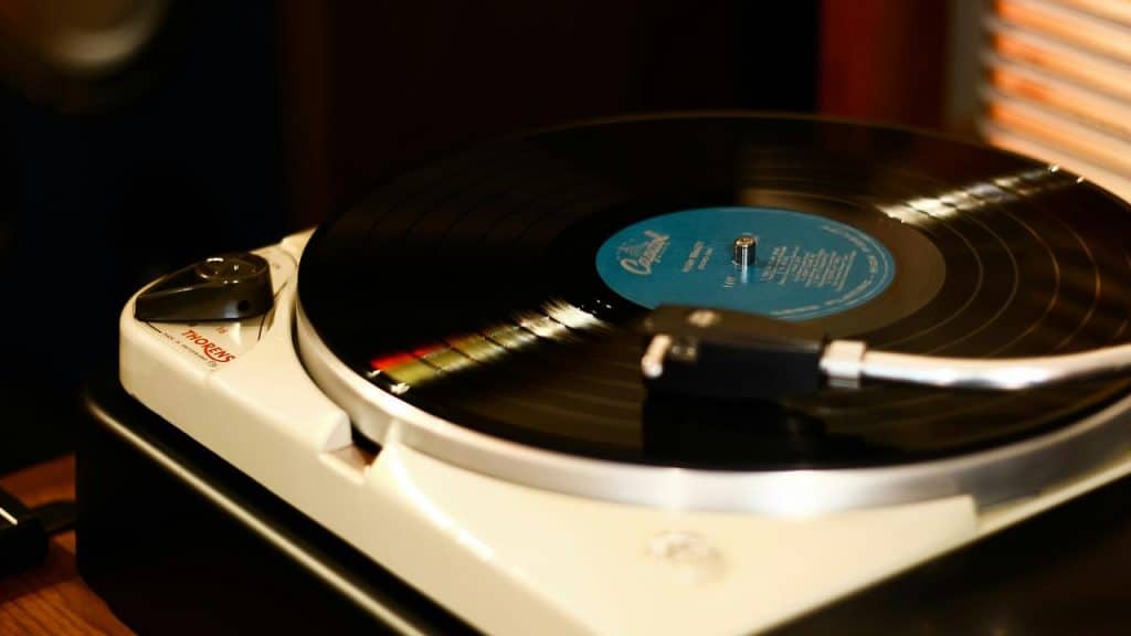 A vinyl record spinning on a turntable.