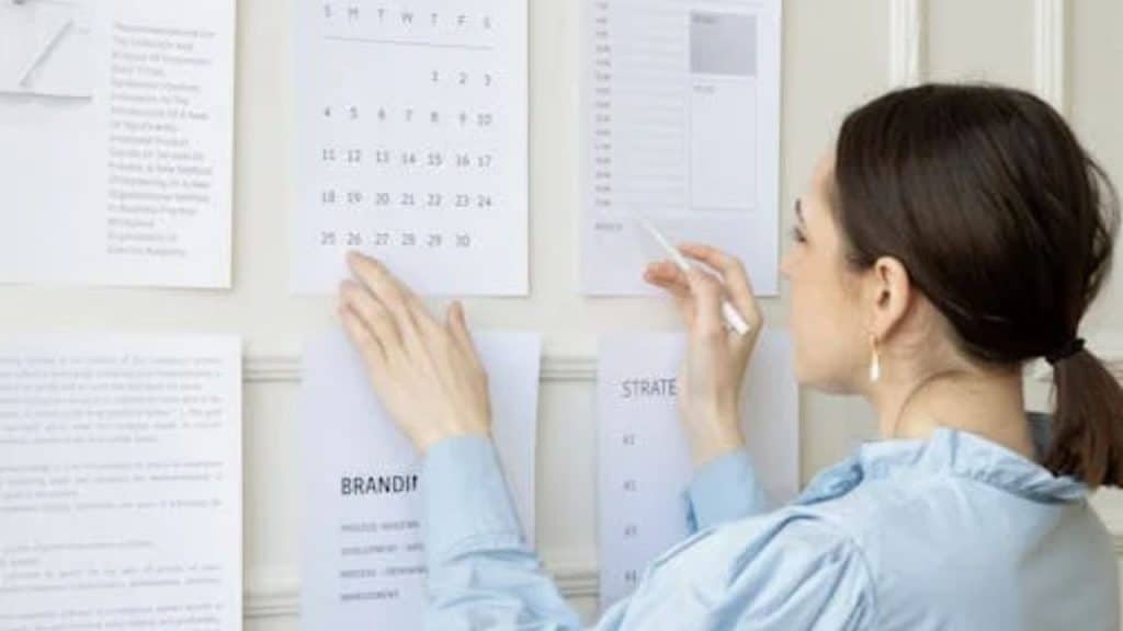 Woman clearing time in her schedule to meet up with a man