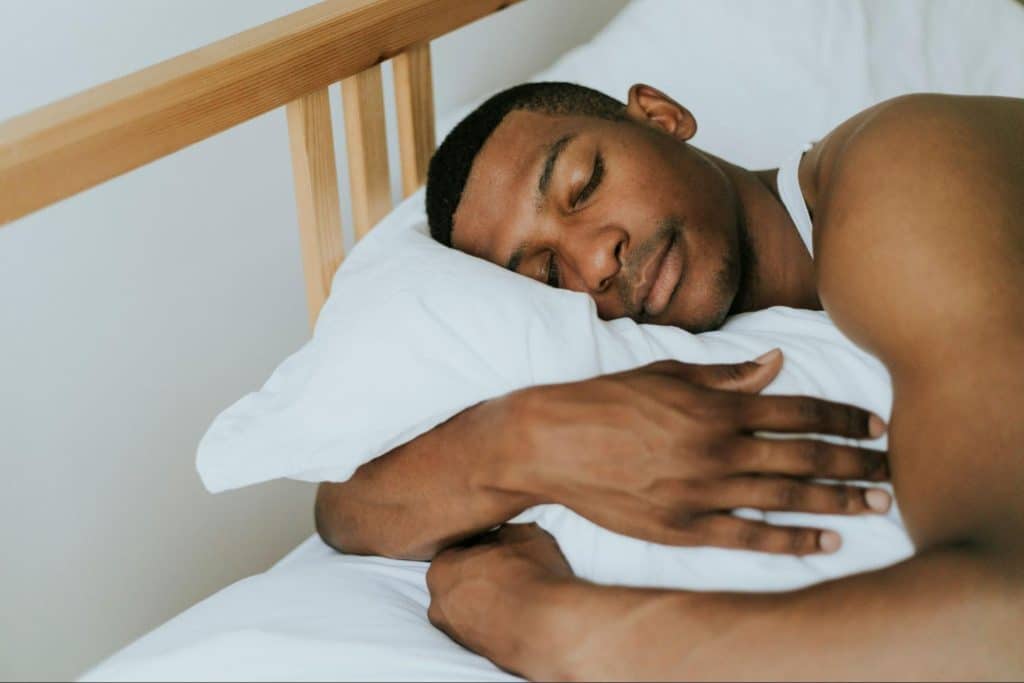 A man sleeping comfortably.