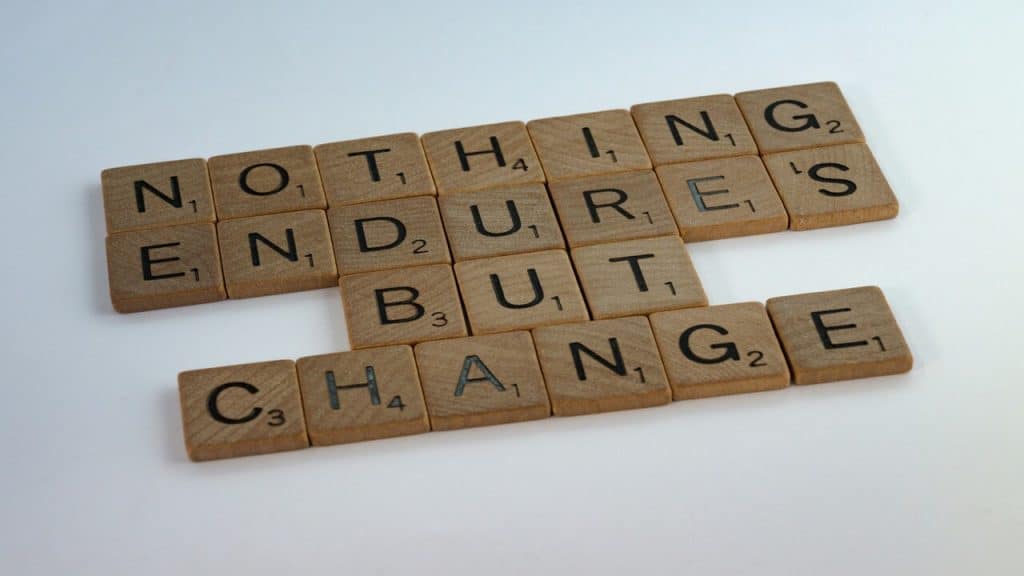 Wooden blocks spelling out “nothing endures but change”