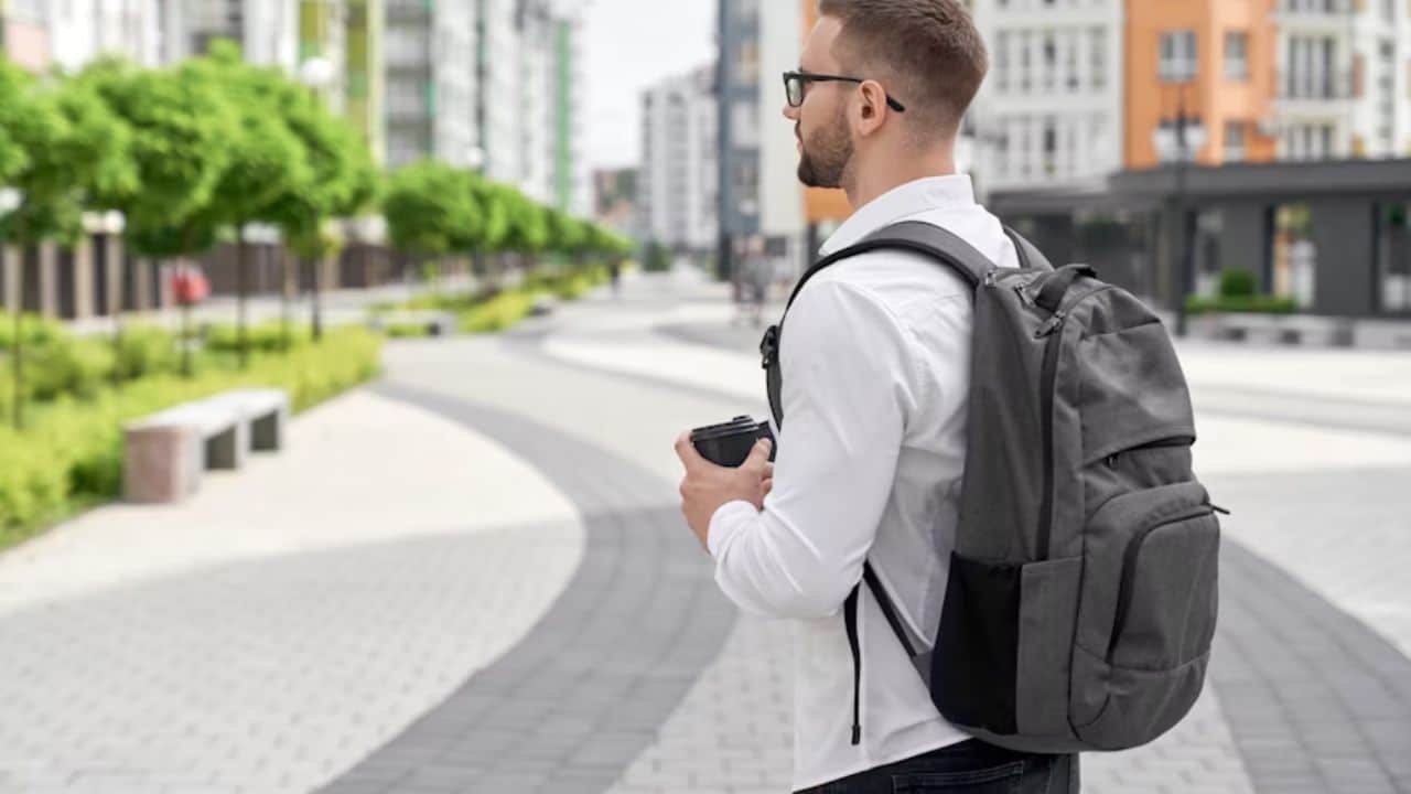 A man walking through a weekend street to help shift emotional energy.