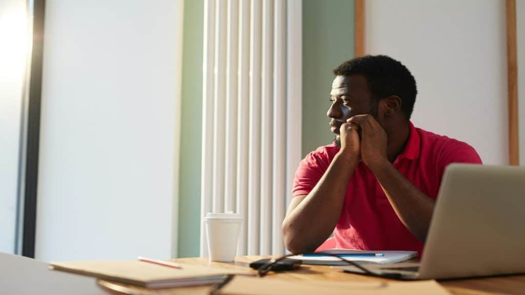 A man looking out the window