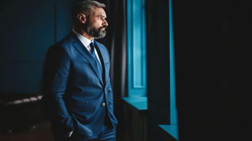 A man looking out the window