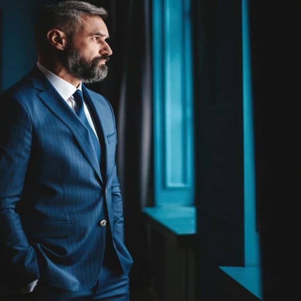 A man looking out the window