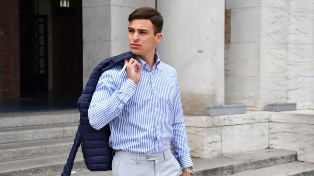 Calm, self assured man walking out with quite confidence