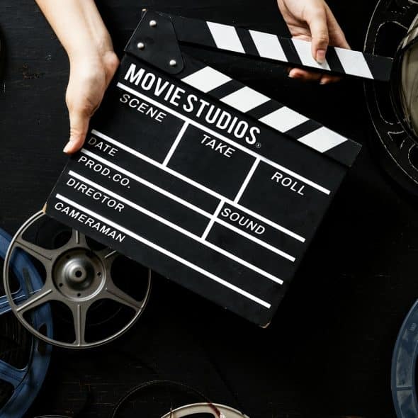 A picture of a film and a studio clipper.