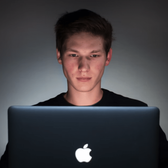A man using his laptop