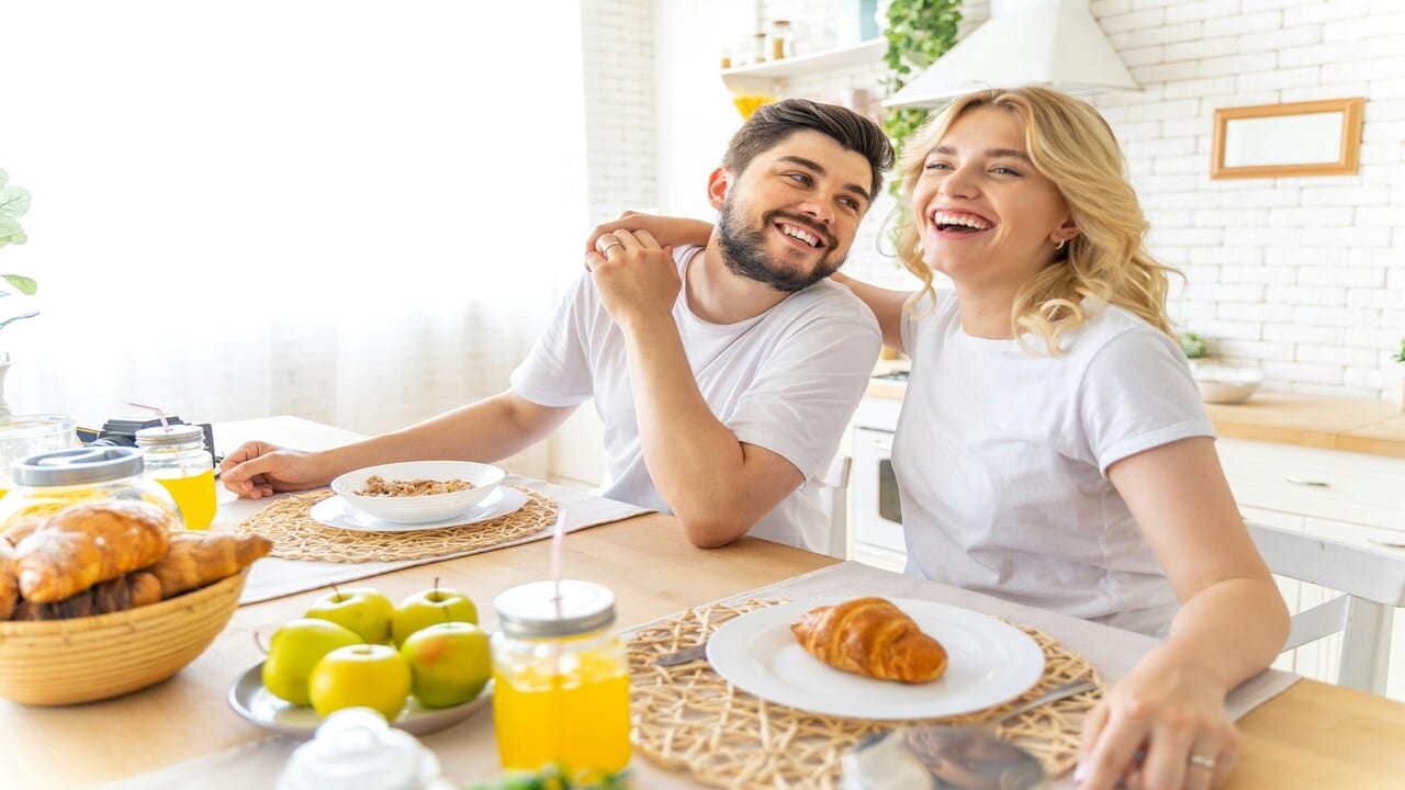 A couple having lunch at home.