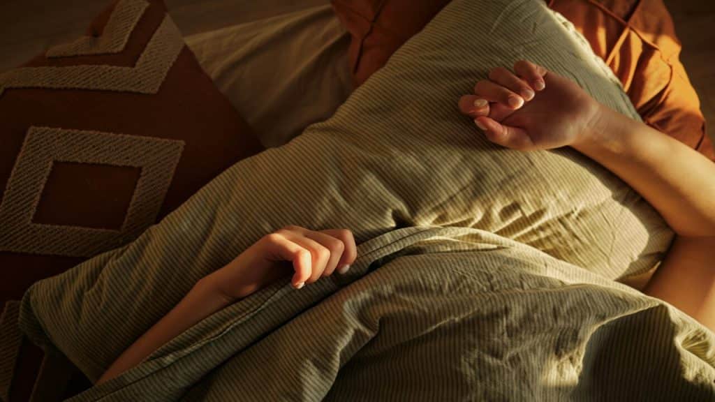 A person sleeping at home.
