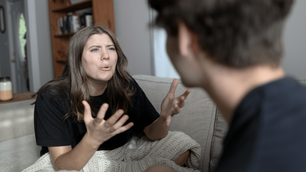 A woman confronting her husband she caught cheating.