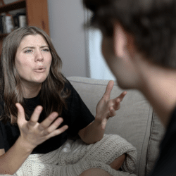 A woman confronting her husband she caught cheating.