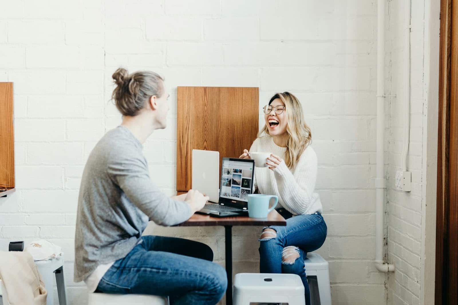 A man having a conversation with a woman.