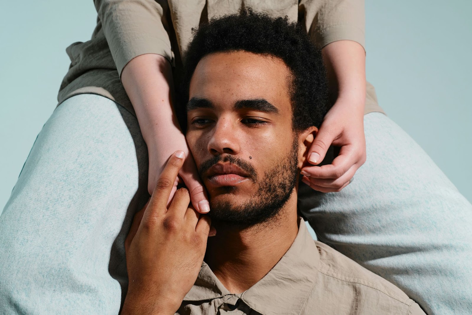 A man with a woman on his back.