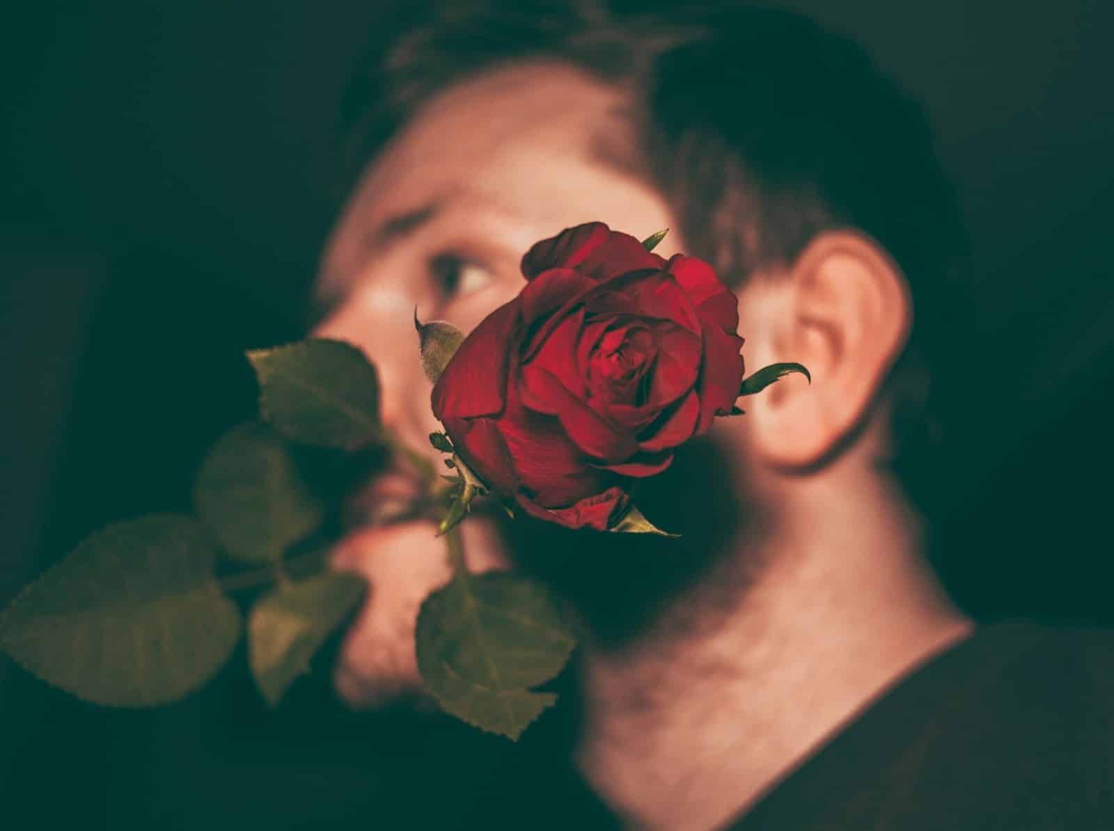 A man with a rose