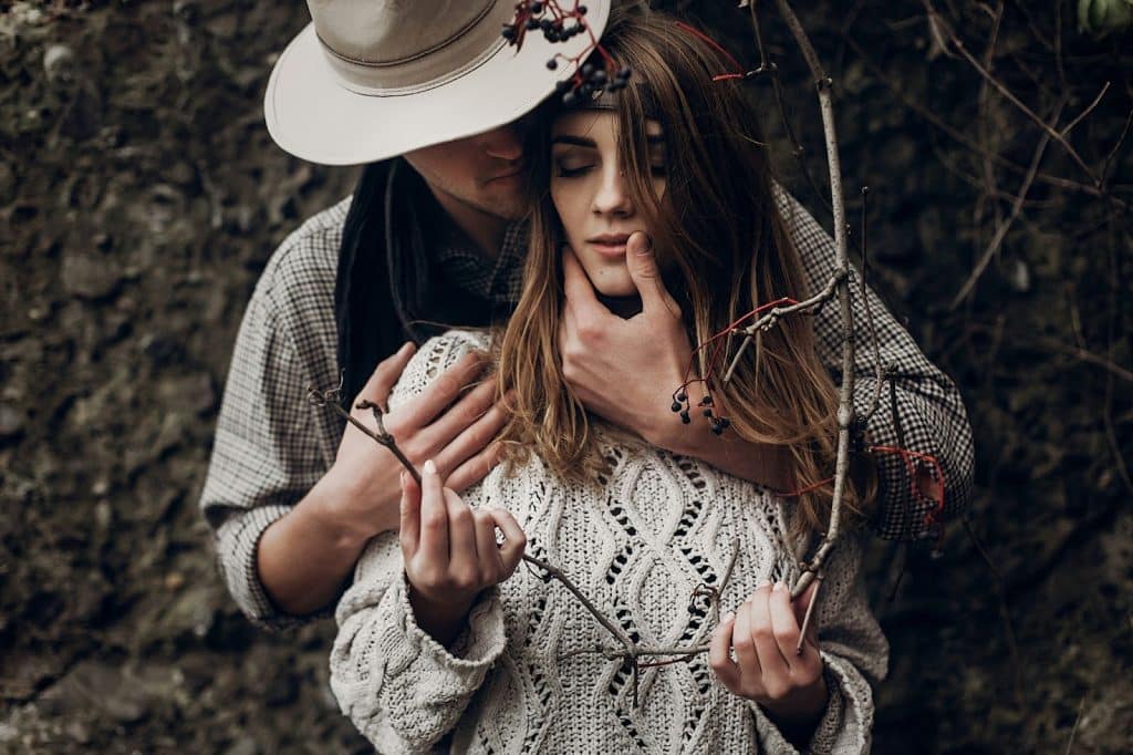A man hugging a woman