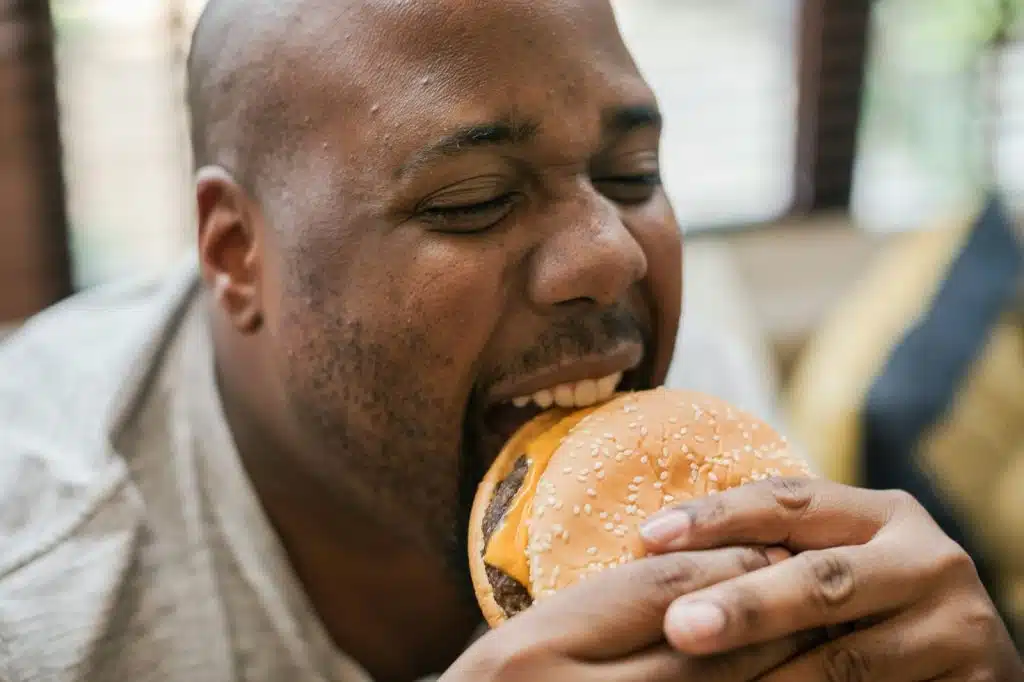 A man eating burger 