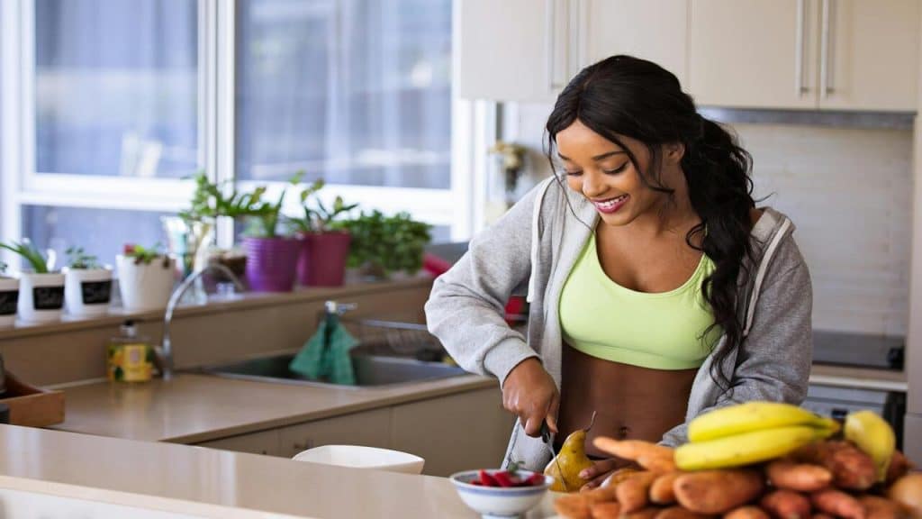 A woman preparing her meal.