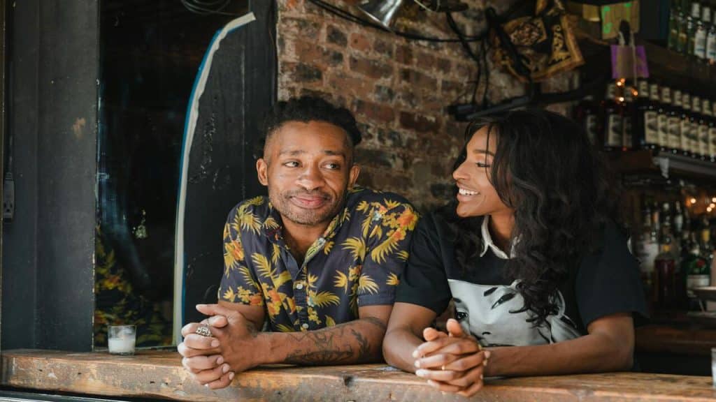 A man not responding while a woman talks to him.