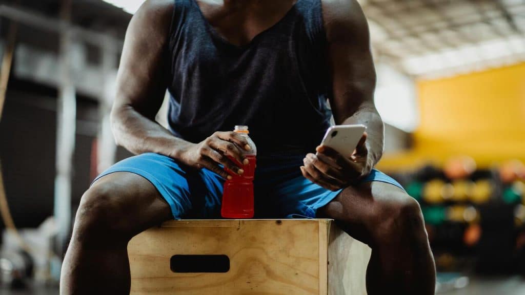 A man taking a selfie at the gym.