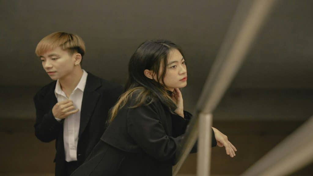 A couple ignoring each other