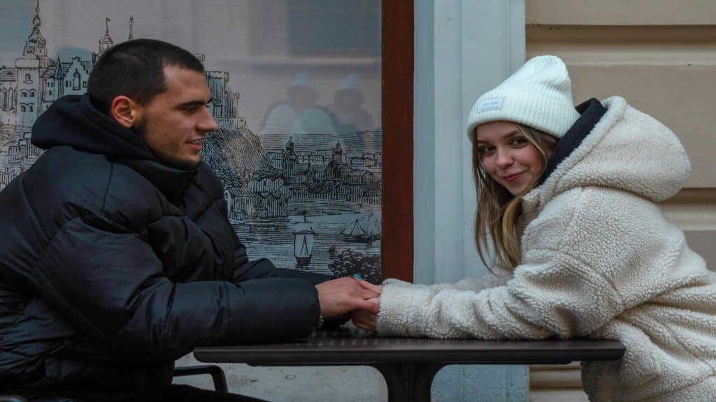 A man looking at his girlfriend