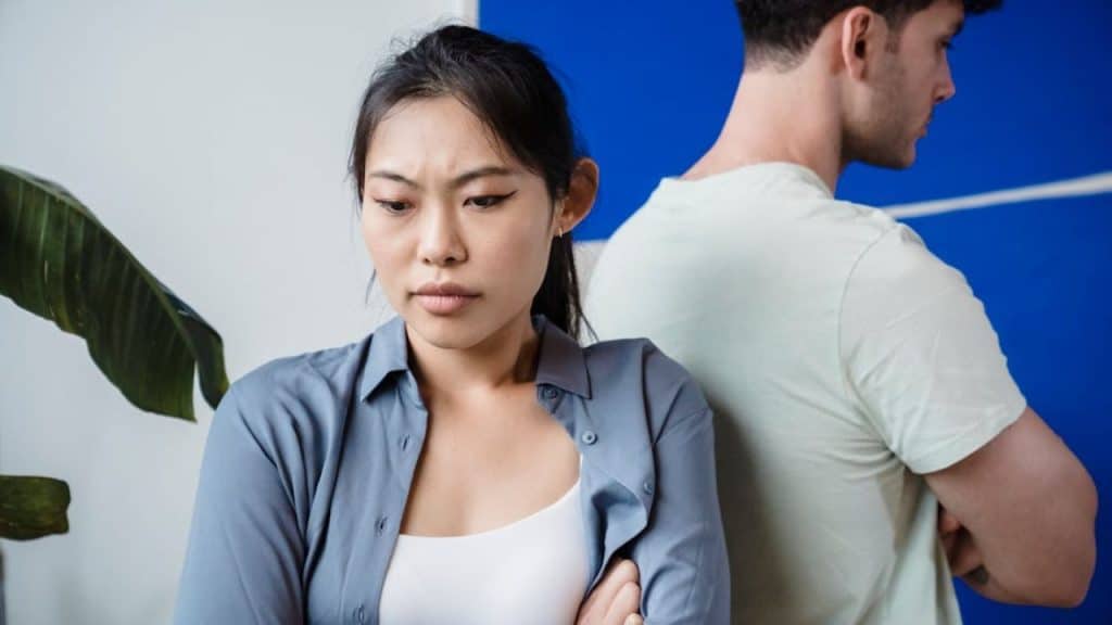 Couple avoiding eye contact after an argument