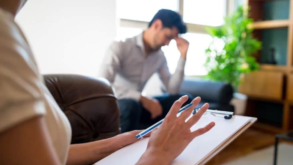 Man reacting sharply during a calm conversation
