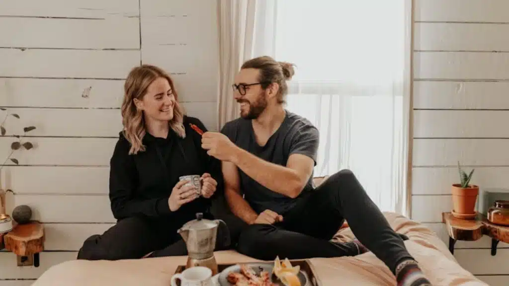 House husband and wife sharing a light morning moment