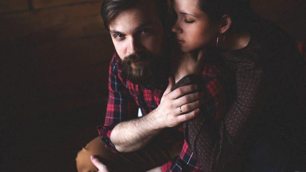 Woman looking drained while man vents.