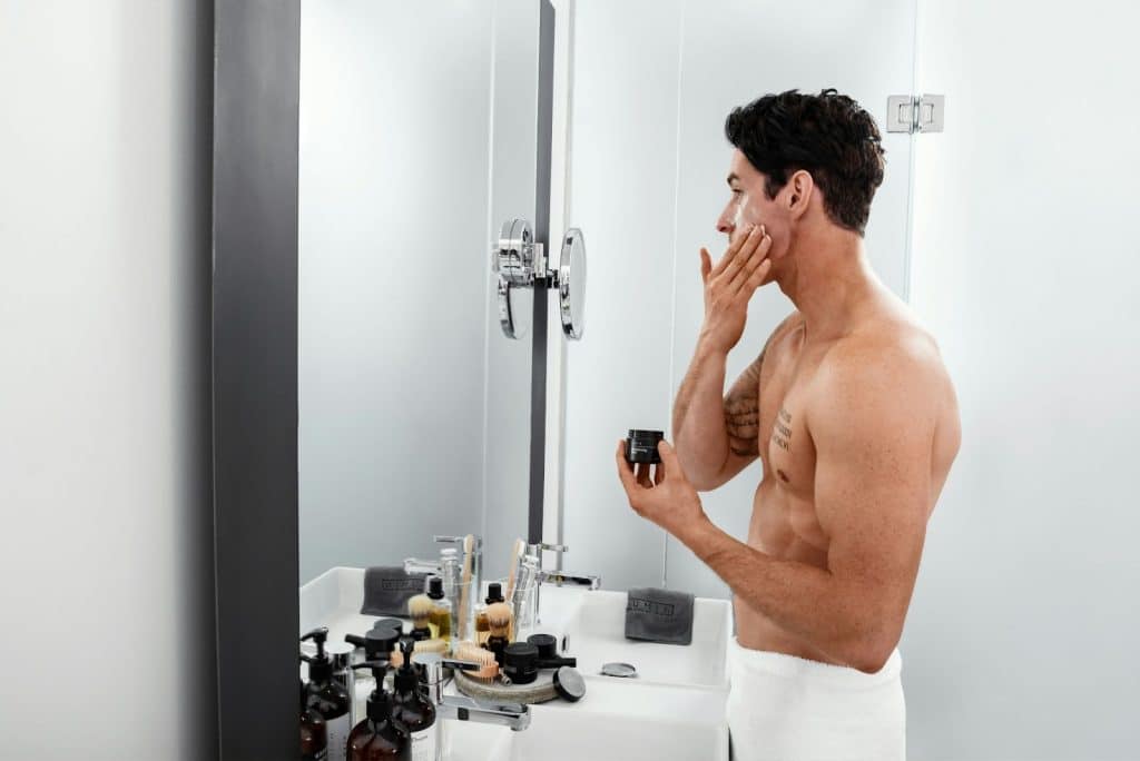 A man doing skincare