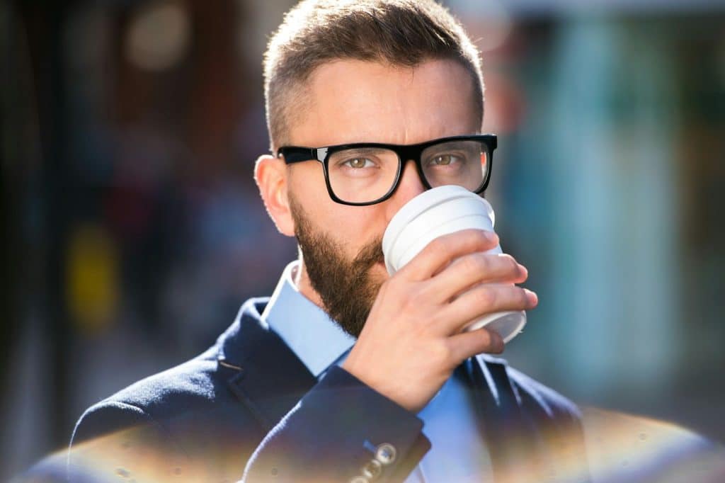 A man drinking coffee