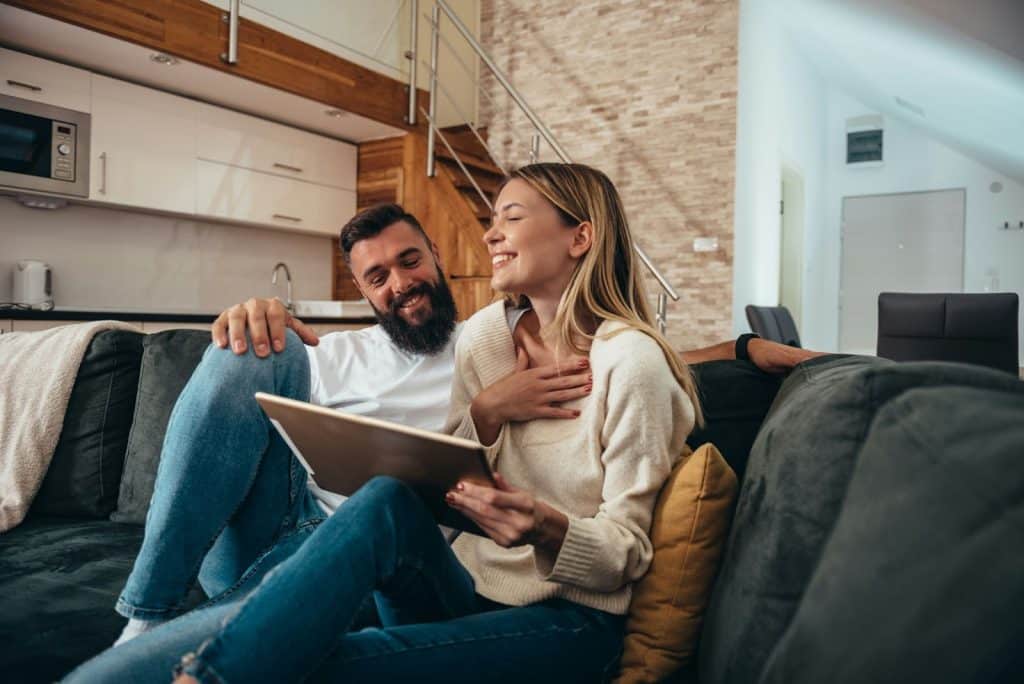 A man and woman at the kitchen 