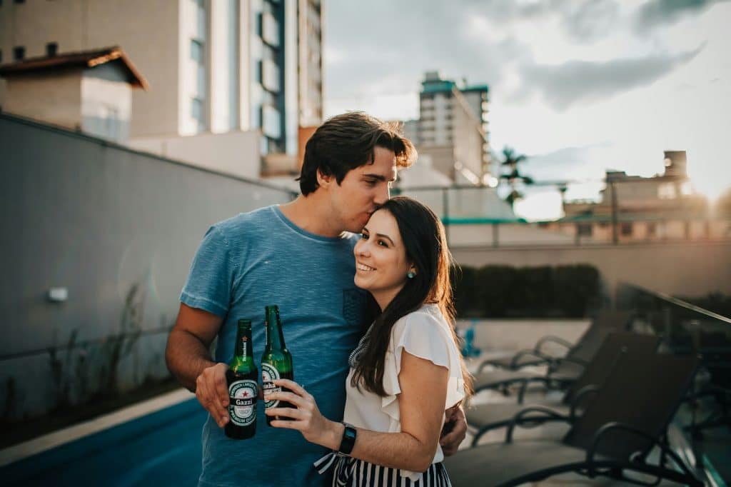A couple having a drink together 