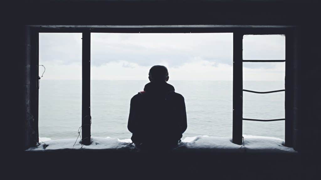 A man looking out the window.