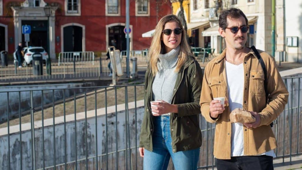 Couple walking side by side, both looking uncertain