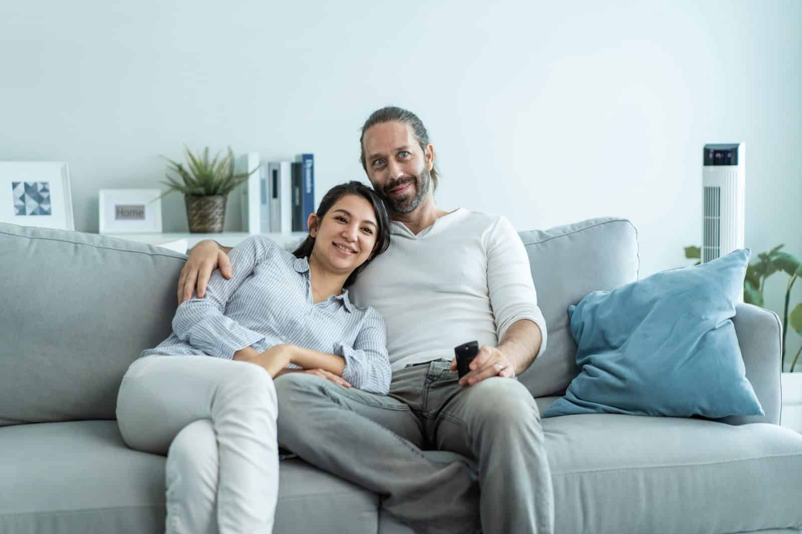 A man and woman at home.