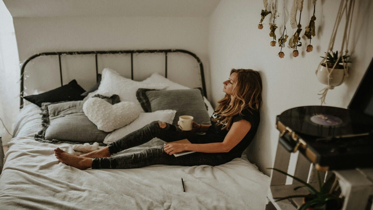 A woman looking lonely at home.