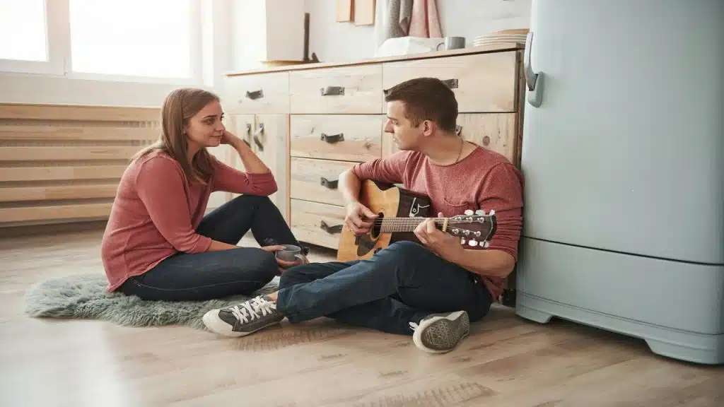 A man serenading a woman.