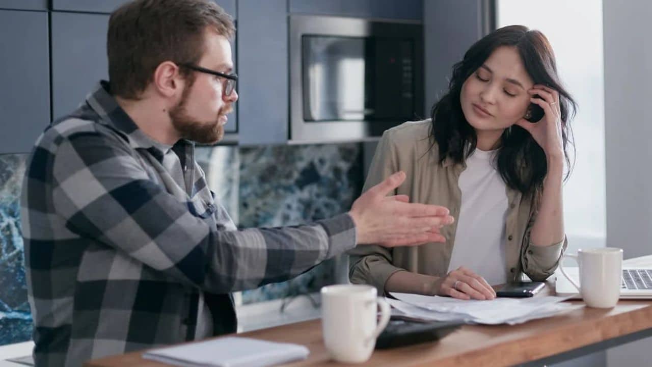 Man refusing to apologize during tense moment in relationship.