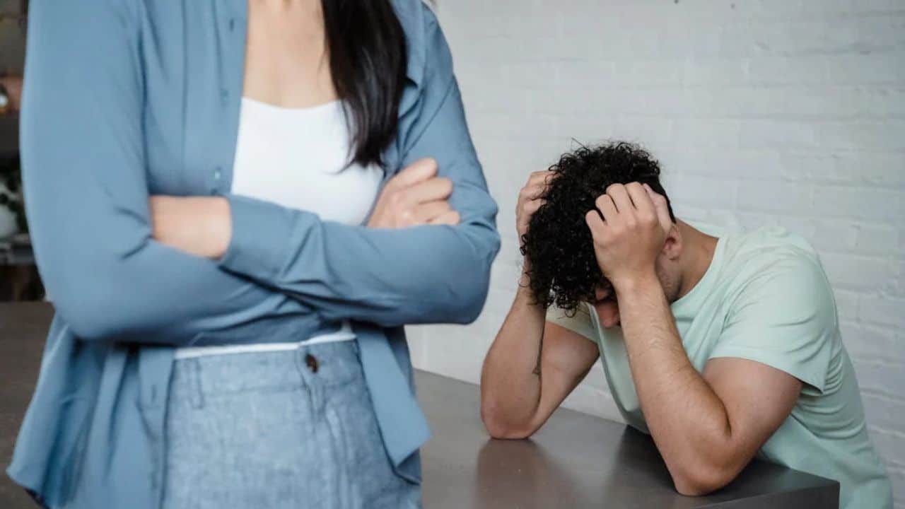  Emotionally guarded man hesitating to share feelings with partner.