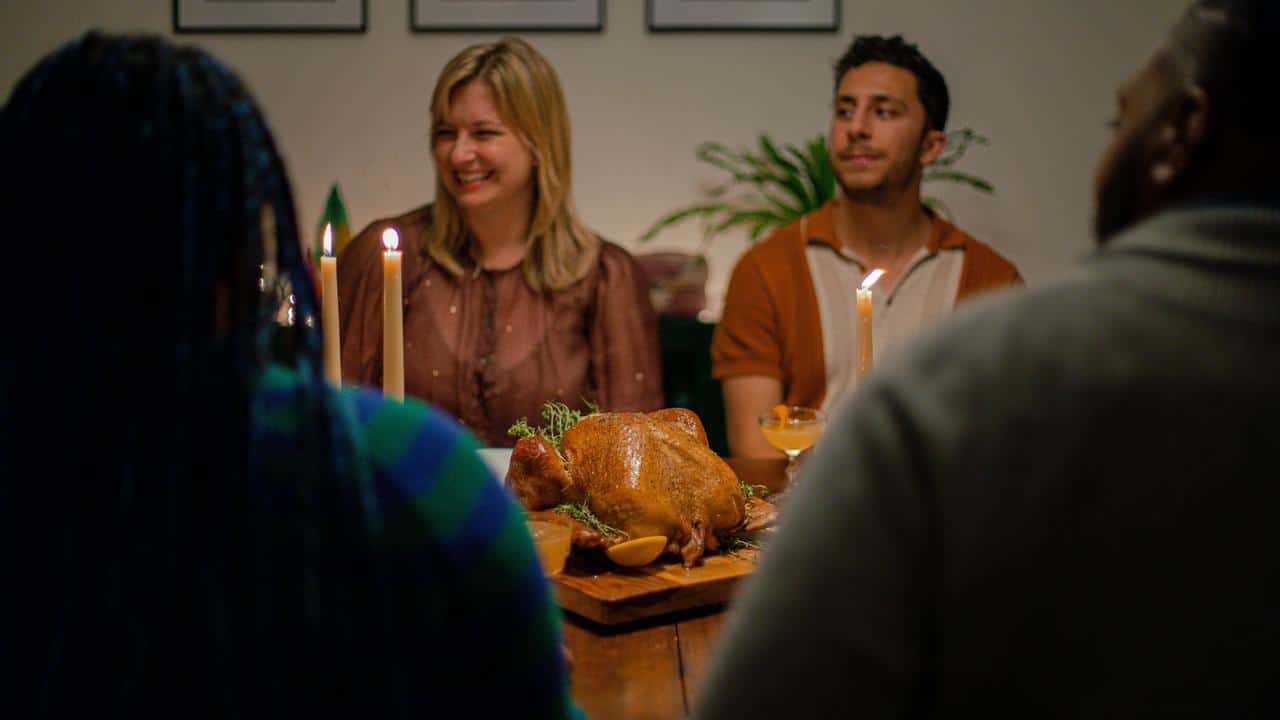 A candlelit turkey dinner with friends.