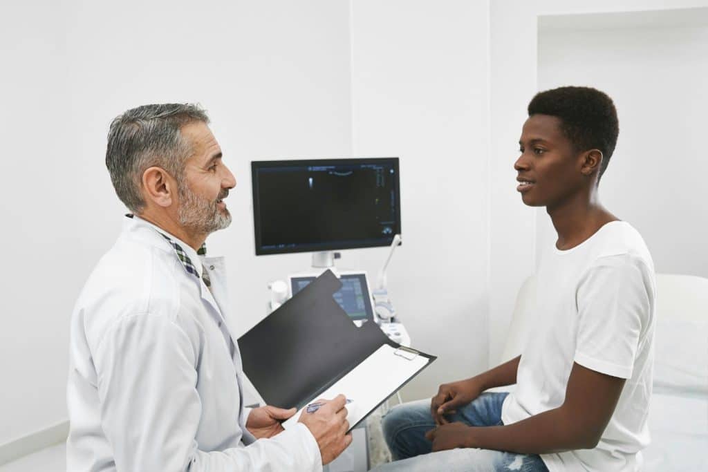 A man talking to a doctor