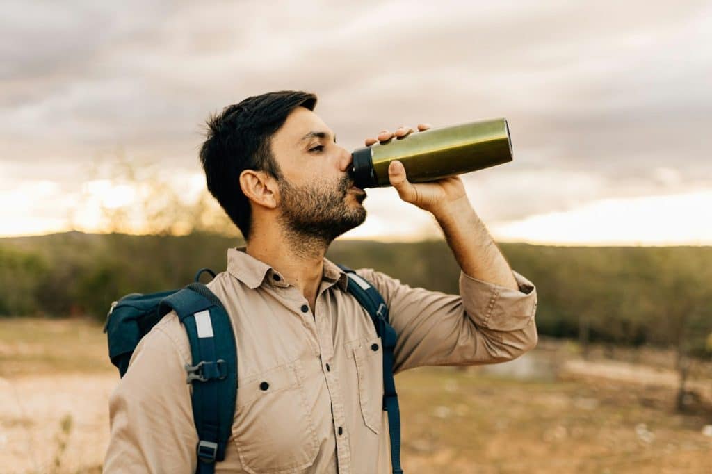 A man drinking water